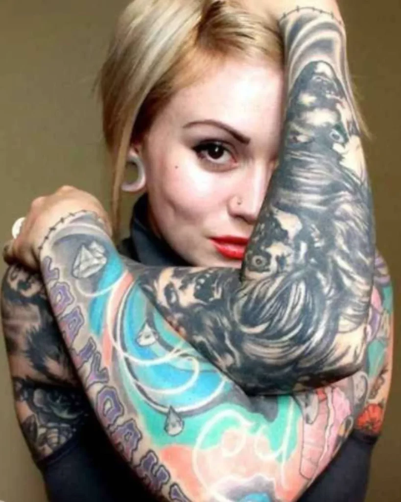 Black and grey and color tattoo on girl