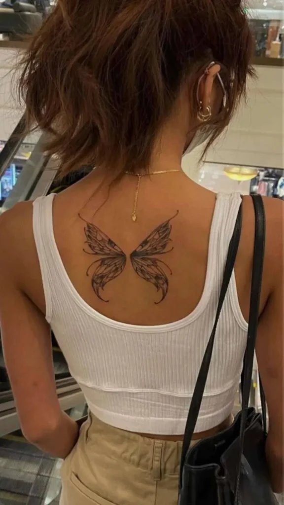 Dark Feminine Back Tattoos_ Butterfly