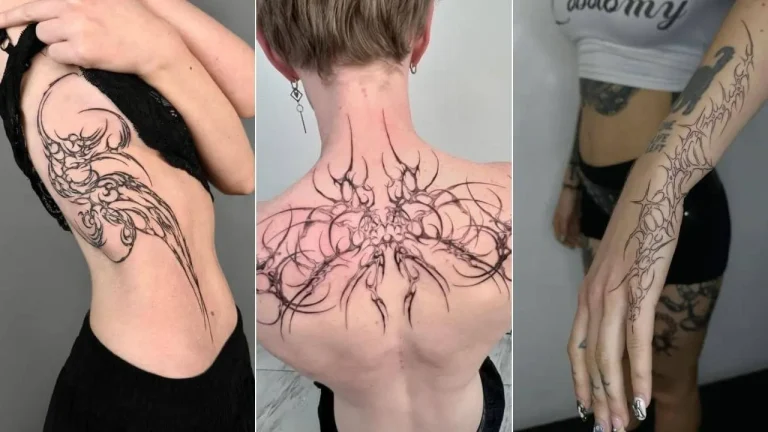 A large Chrome Cybersigilism tattoo design on a thigh, featuring a central heart, sharp, spiky linework, and a 3D liquid-metal chrome finish. Featured image.