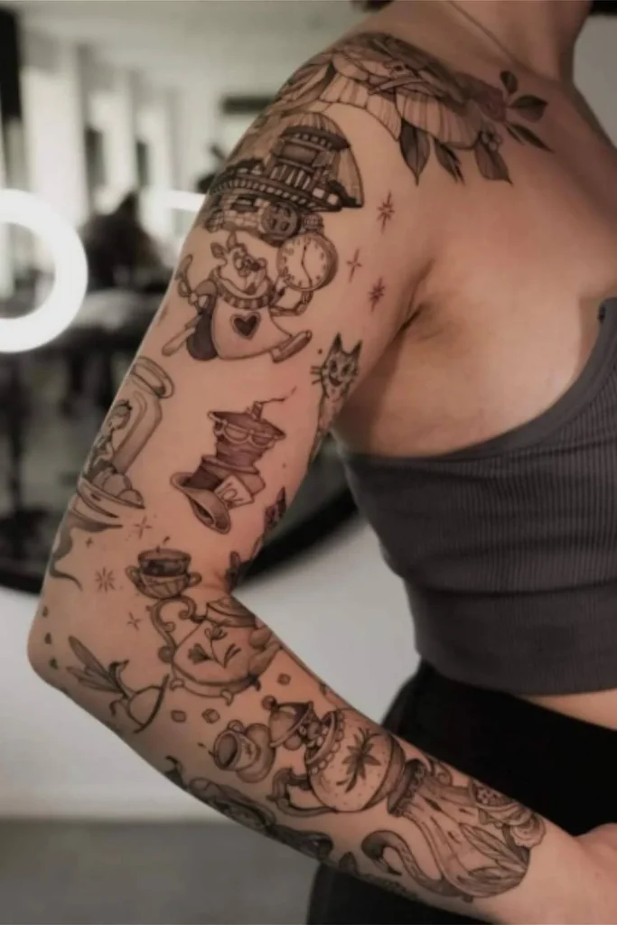 A detailed cohesive Y2K sticker sleeve tattoo on a woman's arm featuring fine-line illustrative patchwork designs.